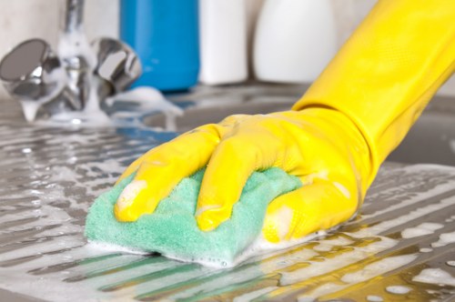 Cleaning supplies and refreshed bedding in a Balham rental property